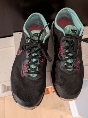 Nike Running Women’s Black Training Shoes with Teal and Pink Accents
